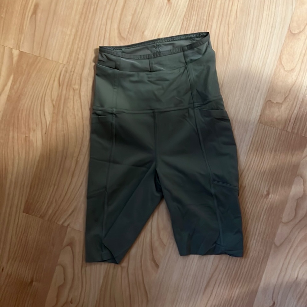 green biker shorts from lululemon with mesh top lining